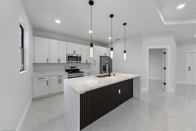 717-719 Gilbert AVE S, Lehigh Acres, FL 33973