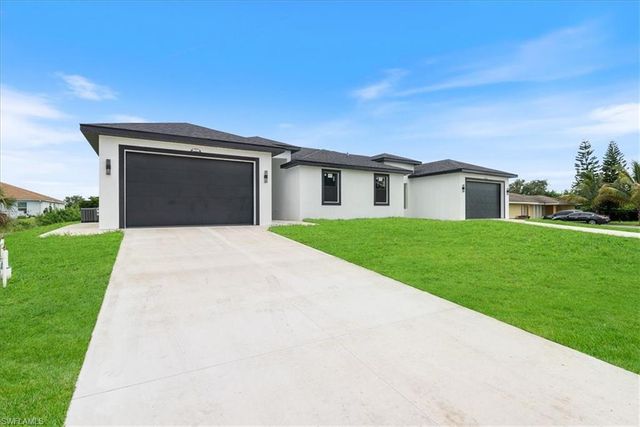 717-719 Gilbert AVE S, Lehigh Acres, FL 33973