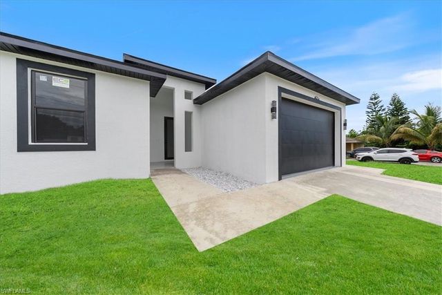 717-719 Gilbert AVE S, Lehigh Acres, FL 33973