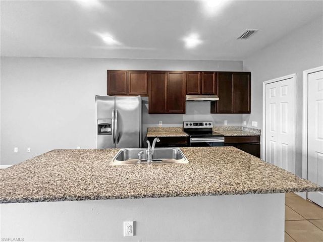 1320 SW Trafalgar PKWY, Cape Coral, FL 33991