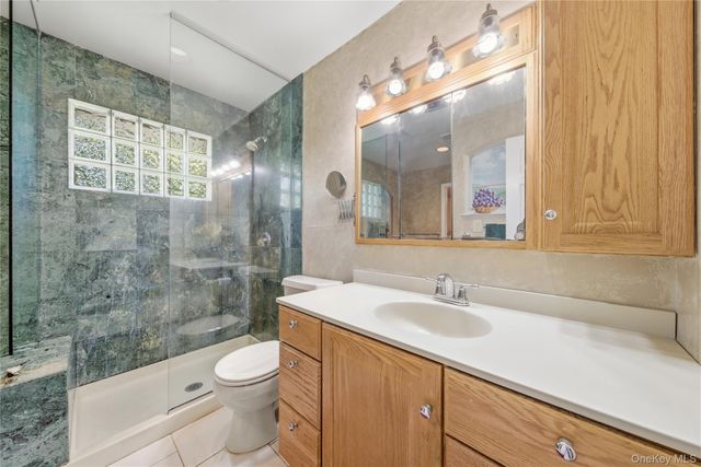99 Redwood Lane, Massapequa Park, NY 11762