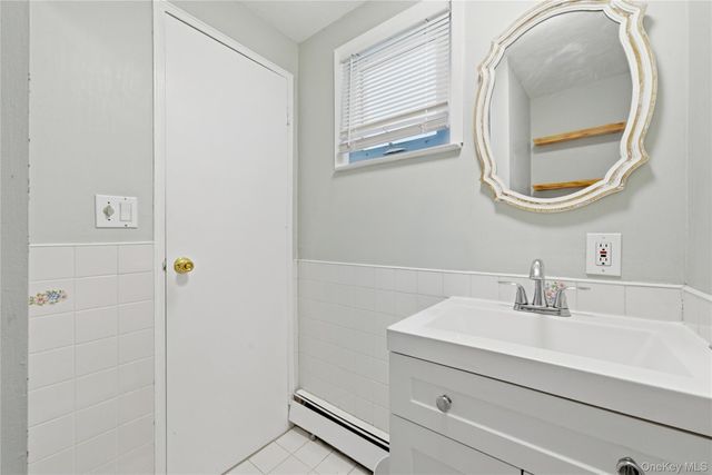 99 Redwood Lane, Massapequa Park, NY 11762