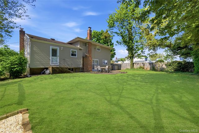 99 Redwood Lane, Massapequa Park, NY 11762