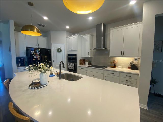 9610 RALLY SPRING LOOP, Wesley Chapel, FL 33545