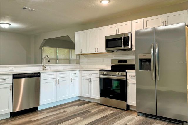 810 NW 59TH COURT, Ocala, FL 34482