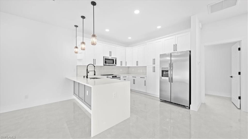 Image 14 of property listing at 1941 NE 15th ST, Cape Coral, FL 33909