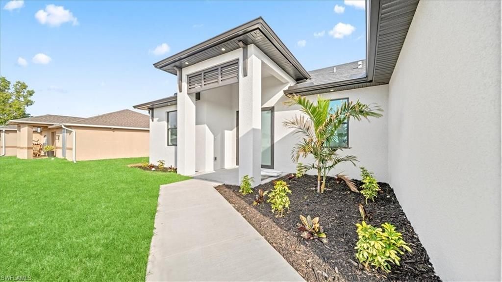 Image 2 of property listing at 1941 NE 15th ST, Cape Coral, FL 33909