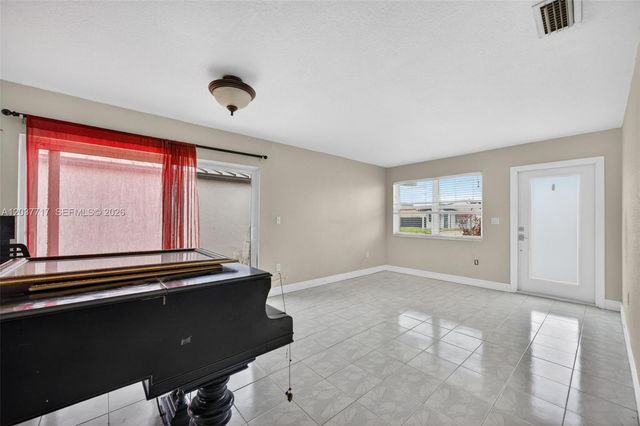 313 NW 132nd Pl, Miami, FL 33182