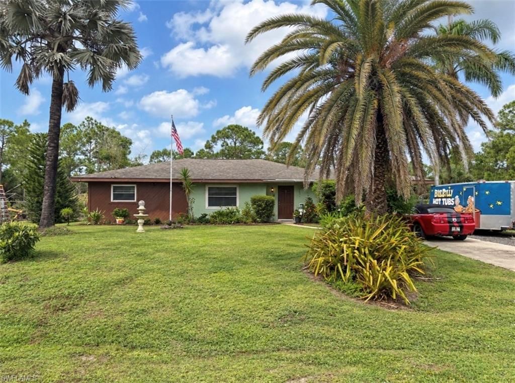 325 Wellington AVE, LEHIGH ACRES, FL 33936 — exterior