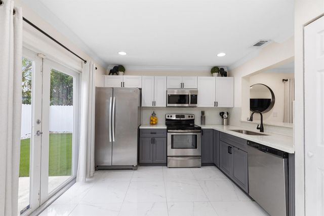 5799 WOODLAND POINT Drive, Tamarac, FL 33319