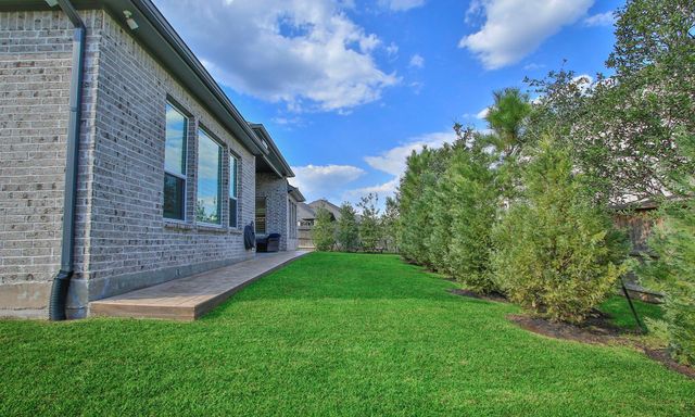 902 Falcon Hollow Lane, Pinehurst, TX 77362