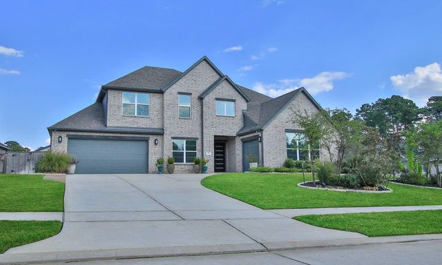 902 Falcon Hollow Lane, Pinehurst, TX 77362