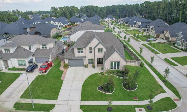 902 Falcon Hollow Lane, Pinehurst, TX 77362