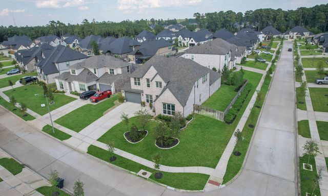 902 Falcon Hollow Lane, Pinehurst, TX 77362