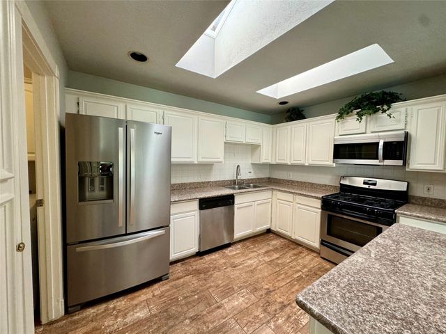 78 Wind Whisper Court, The Woodlands, TX 77380