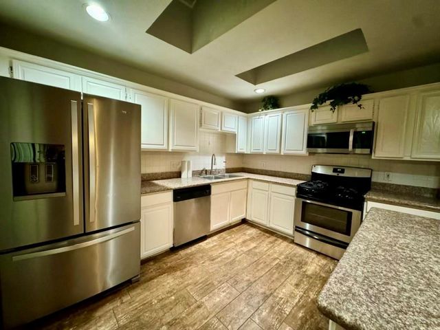 78 Wind Whisper Court, The Woodlands, TX 77380