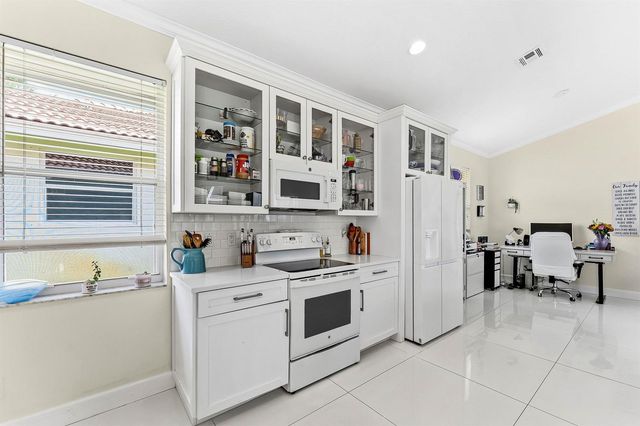 104 Hidden Hollow, Palm Beach Gardens, FL 33418
