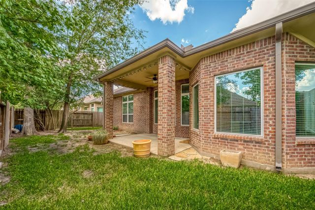 22019 Flashing Ridge Drive, Spring, TX 77389