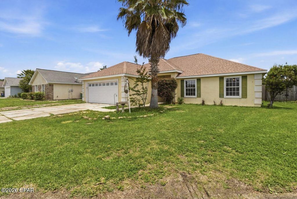 Image 1 of property listing at 303 Aralia Circle, Panama City Beach, FL 32408