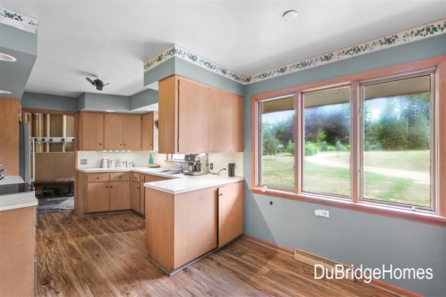 311 Honey Creek Avenue, Ada, MI 49301