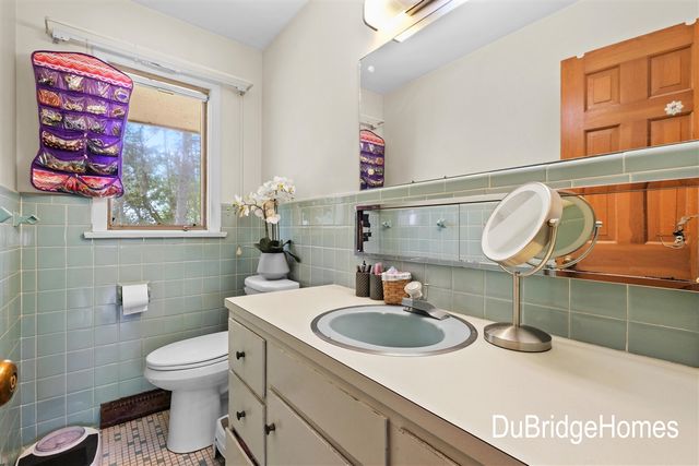 311 Honey Creek Avenue, Ada, MI 49301