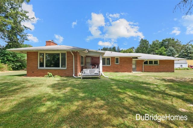 311 Honey Creek Avenue, Ada, MI 49301