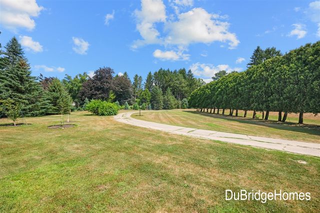 311 Honey Creek Avenue, Ada, MI 49301