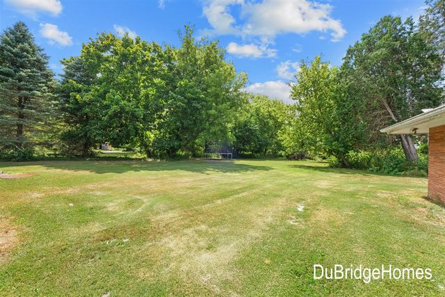 311 Honey Creek Avenue, Ada, MI 49301