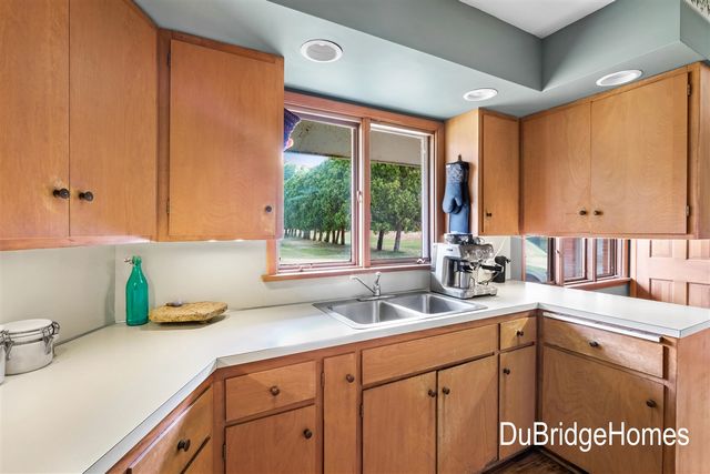 311 Honey Creek Avenue, Ada, MI 49301