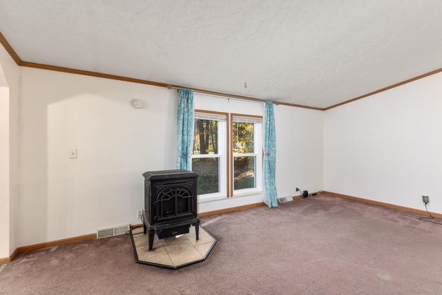 6585 Crystal Lake Rd, Holton, MI 49425