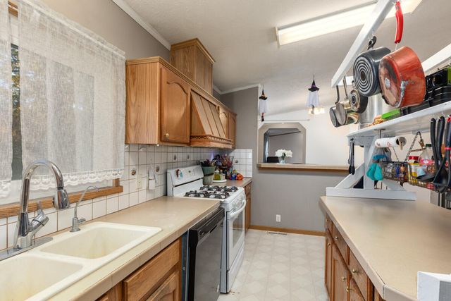 6585 Crystal Lake Rd, Holton, MI 49425