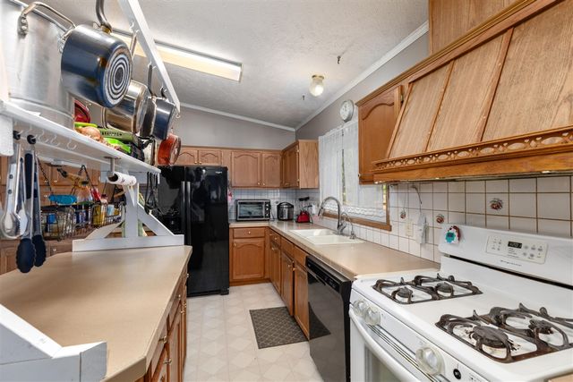 6585 Crystal Lake Rd, Holton, MI 49425