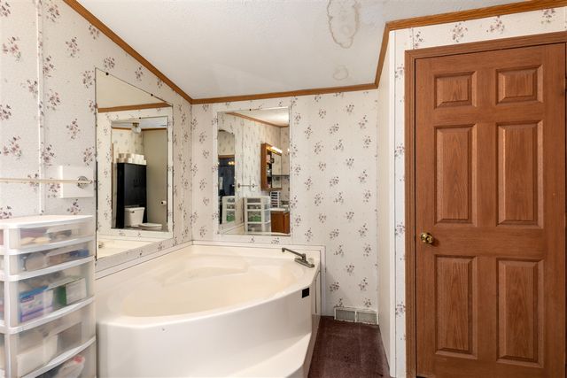 6585 Crystal Lake Rd, Holton, MI 49425