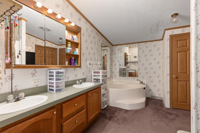 6585 Crystal Lake Rd, Holton, MI 49425