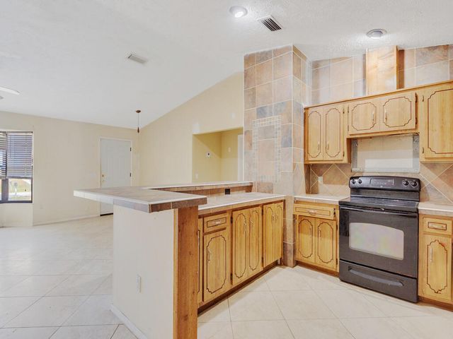 502 NW Goldcoast Avenue, Port St. Lucie, Port St Lucie, FL 34983