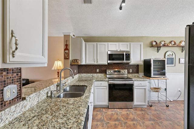 11830 SINDLESHAM COURT, Orlando, FL 32837