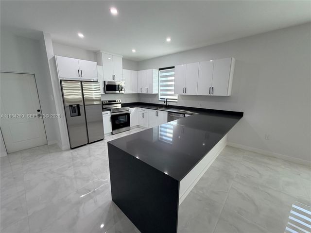 1111 GUNBY AVE S, Lehigh Acres, FL 33974