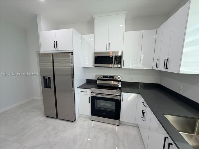 1111 GUNBY AVE S, Lehigh Acres, FL 33974