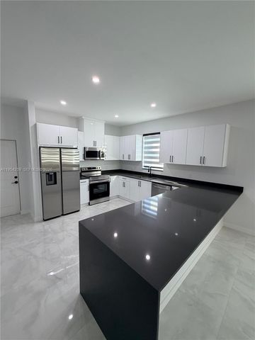 1111 GUNBY AVE S, Lehigh Acres, FL 33974