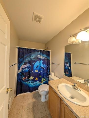 4090 Grand Oaks Trail, Burton, MI 48519