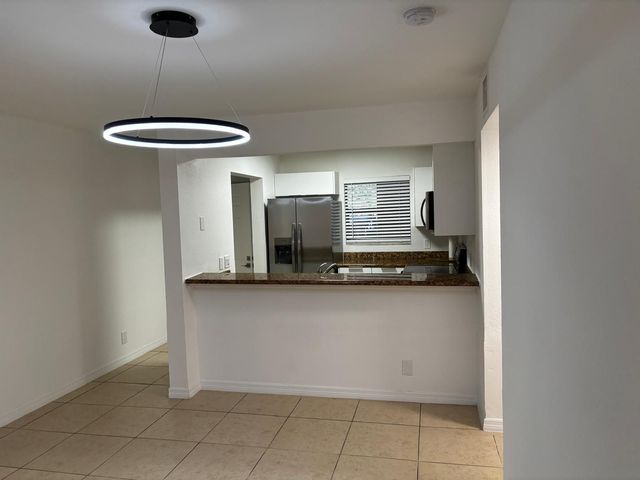 1515 LAKE CRYSTAL Drive B, West Palm Beach, FL 33411
