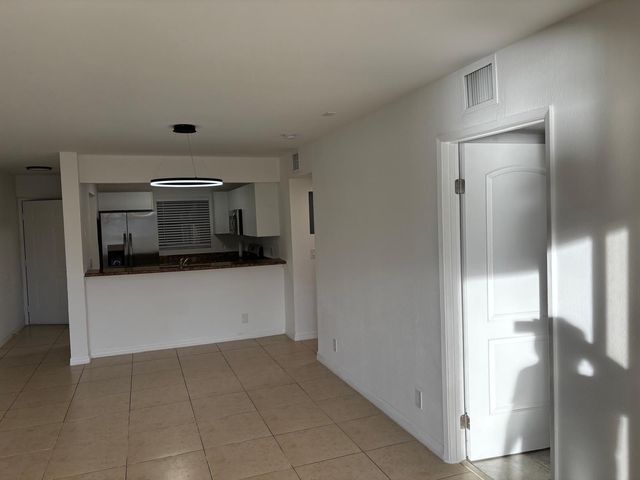 1515 LAKE CRYSTAL Drive B, West Palm Beach, FL 33411