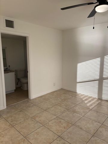 1515 LAKE CRYSTAL Drive B, West Palm Beach, FL 33411