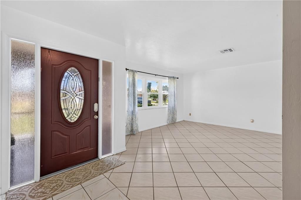 1118 SE 18th ST, CAPE CORAL, FL 33990 — photo 3