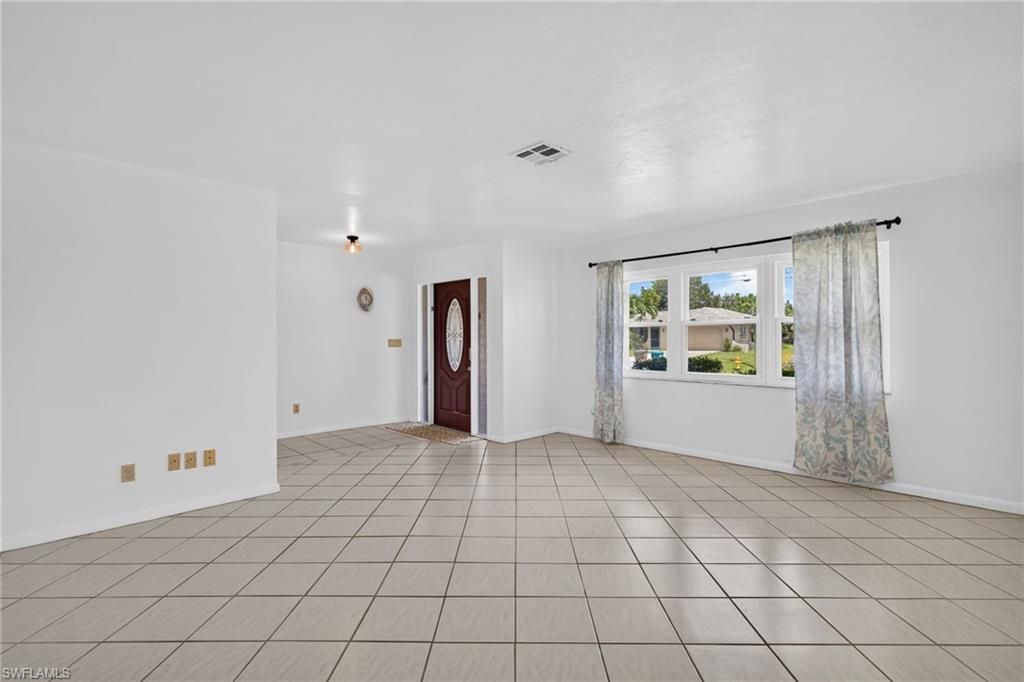 1118 SE 18th ST, CAPE CORAL, FL 33990 — photo 4