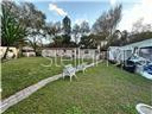 6902 RHODE ISLAND DRIVE, Tampa, FL 33619