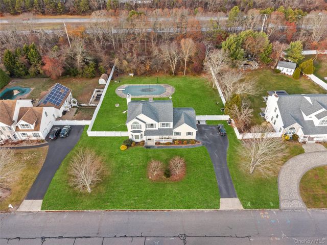 7 Bittersweet Lane, Center Moriches, NY 11934