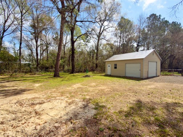 23418 Pine Forest Drive, New Caney, TX 77357