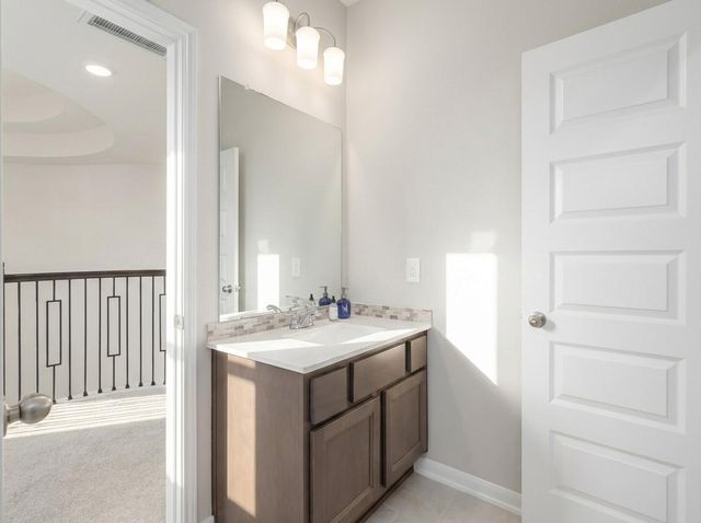 318 Calmato Woods Way, Willis, TX 77318