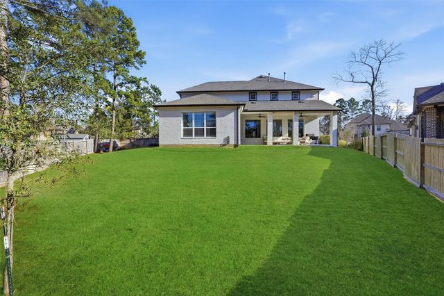 318 Calmato Woods Way, Willis, TX 77318